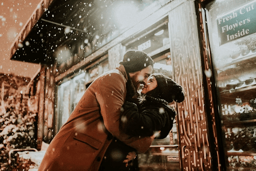 Man and woman hugging each other in a cold weather 