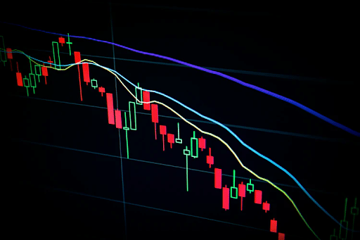 red and blue light streaks indicating the rise and fall of the stock marke