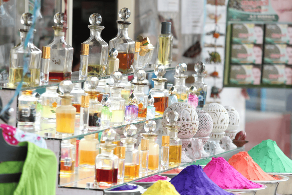 a variety of fragrances in display (beauty fragrance image)