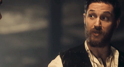 Alfie Solomons nodding to someone on his left side