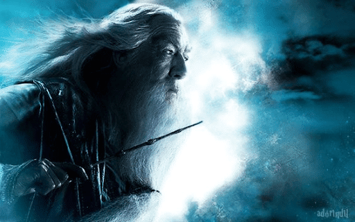 Dumbledore with his wand and wind blowing his hair