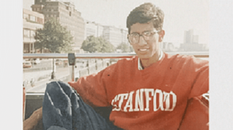 a young Sundar Pichai in a red Stanford sweatshirt
