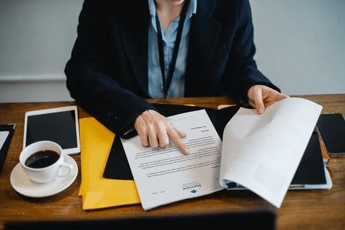  Crop Businesswoman Working with Documents